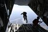 A service member jumps from a US Air Force C-130J Hercules during a Military Freefall Jumpmaster Course c USAF