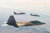 F-22 F-35 XQ-58A in formation