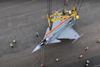 Saab F-39E being hoisted off ship in Brazil c Screenshot of Saab promotional video
