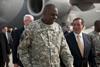 Gen. Lloyd J. Austin III commander United States Forces-Iraq walks with Secretary of Defense Leon Panetta as he arrives in Baghdad for the end of mission ceremony for the Iraq War
