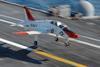 T-45 Goshawk training aircraft lands on the flight deck of the Nimitz-class aircraft carrier USS Theodore Roosevelt