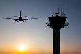 Air traffic control tower sunset