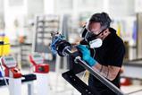 A Collins Aerospace technician applies sealant to an actuahttps://dvvfg.webvisioncloud.com/CMS/imageAddEdit.aspx?label=attimages&id=1tor, part of the A350 electric thrust reverser actuation system (elecTRAS) on the new production line in Colomiers, France