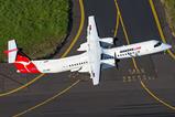 QantasLink Dash 8-400-c-Lance C Broad Creative Commons