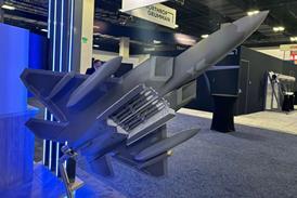 Low-observable external fuel tanks for F-22 model at AFA Warfare Symposium