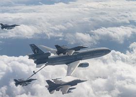 Omega KDC-10 with USAF F-16s c USAF