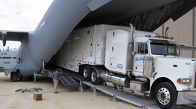 MQ-4C ground control station C-17 loading c US Navy