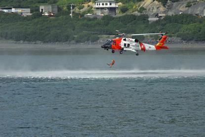 US Coast Guard MH-60T rescue swimmer c USCG