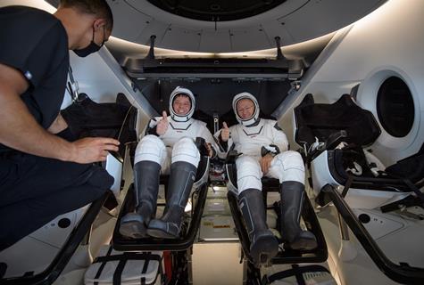 SpaceX Dragon crew Robert Behnken left Douglas Hurley