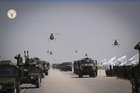 Taliban victory day parade MD Helicopters