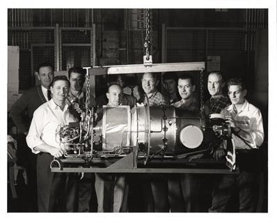 pw-p34-Powerbook1_p153_Men_PT6_shop_gather_around_first_production_PT6_shipped_Beech_December22_1963 (1)