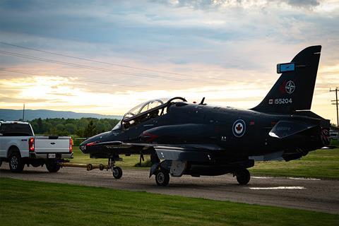 CT-155 Hawk towed behind pick up c RCAF