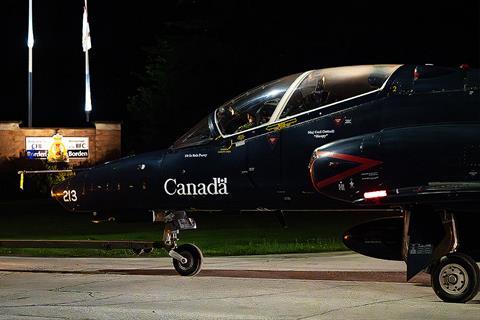 Close up of CT-155 passing CFB Borden gate c RCAF