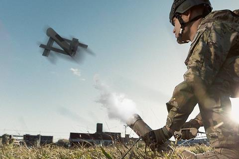 Soldier launching Switchblade c Aerovironment