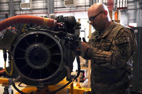 Soldier mechanic works on T700 engine