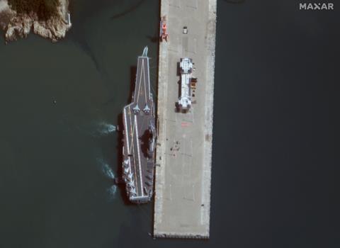 Shandong docked at Hainan.