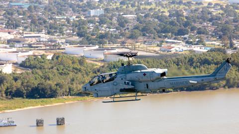 AH-1W Super Cobra on sundown ceremony flight c US Marine Corps