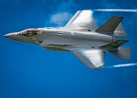 Major Kristin Wolfe displaying F-35A