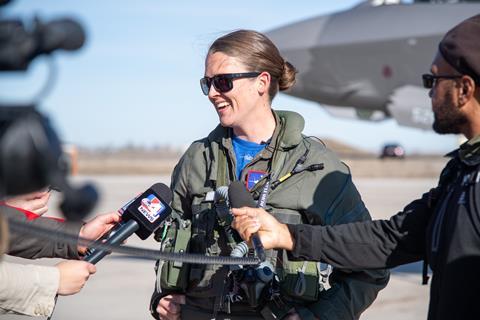 Major Kristin Wolfe with media