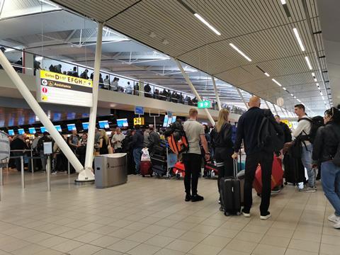 Schiphol Airport passengers queue May 2022
