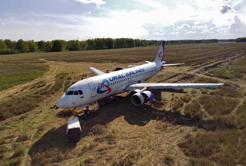 Ural A320 in field 2-c-Ural Airlines