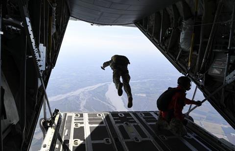 A service member jumps from a US Air Force C-130J Hercules during a Military Freefall Jumpmaster Course c USAF