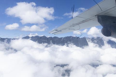 A No 35 Squadron C-27J Spartan fly's over Enga Province, Papua New Guinea