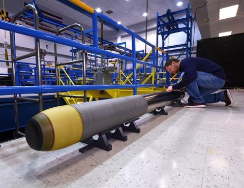 Northrop Grumman’s Very Lightweight Torpedo prototype being prepared next to its Acoustic Test Facility tank in Annapolis Maryland.