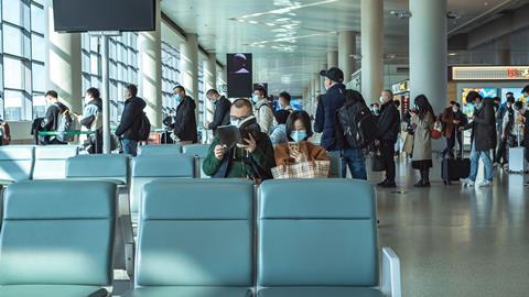 Passengers at Shanghai airport Feb 21