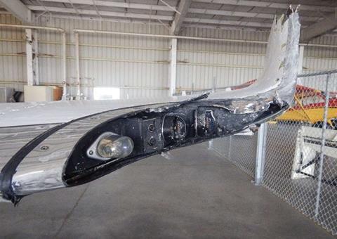 N269AA wing-tip damage-c-NTSB
