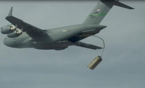 A high altitude airdrop of palletized munitions (JASSM simulants) from a C-17 using standard operational airdrop procedures c USAF