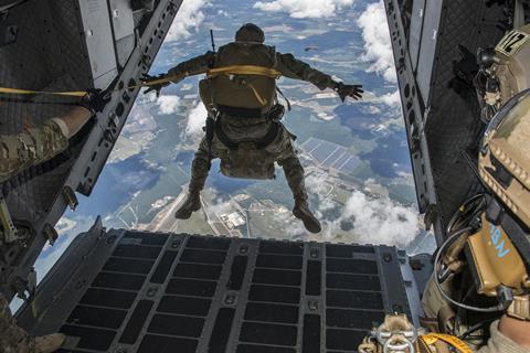 A jumper rigged in the RA1 Double Bag Static Line System exits the C-27J aircraft. US Army credit