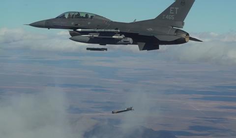 Collaborative Small Diameter Bombs (CSDBs) are launched from the wing of an F-16 fighter from the Air Force Test Center’s 96th Test Wing at Eglin AFB c AFRL