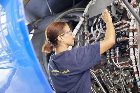 Woman working for Lufthansa Technik MRO