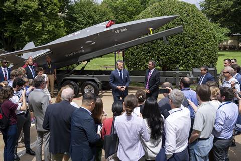 Hegseth with XQ-58A c OSD