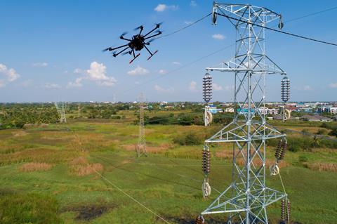 Octocopter flying near power lines