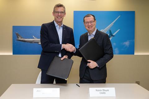 (L-R) Jean-Brice Dumont, Executive Vice-President, Engineering, Airbus with Kevin Shum, Director-General of CAAS