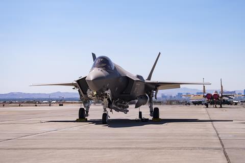 F-35A Lighting II carrying a B61-12 Joint Test Assembly sits on the flight line at Nellis Air Force Base c USAF