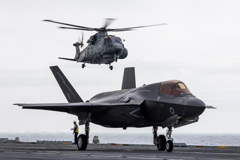 Royal Navy Crowsnest Merlin with F-35B