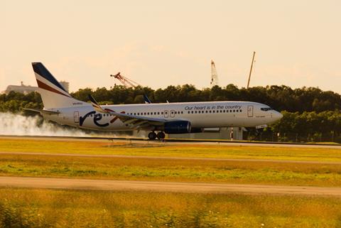 REX_Boeing_737-800_(VH-RYU)_touchdown_at_Brisbane_airport_(BNE_-_YBBN)_2022.08.09