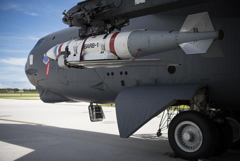 Quick Strike extended range mine hangs from a B-52 on Andersen Air Force Base Guam