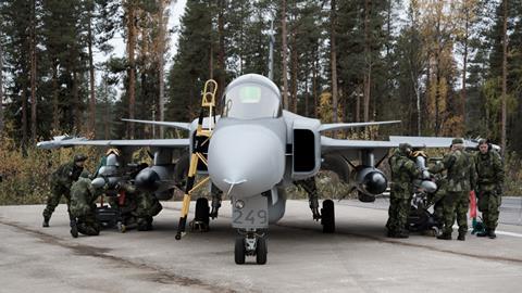 Saab Gripen in wooded flightline position c Saab
