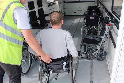 Wheelchair passenger loading onto aircraft