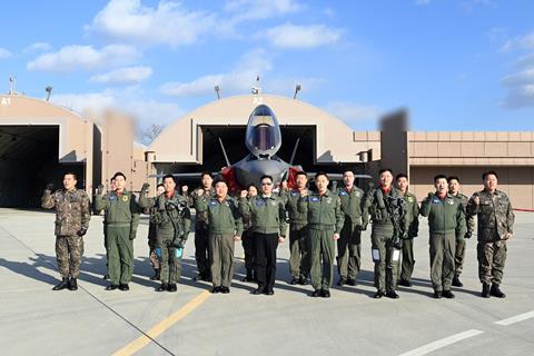 Korean defence minister with ROKAF personnel