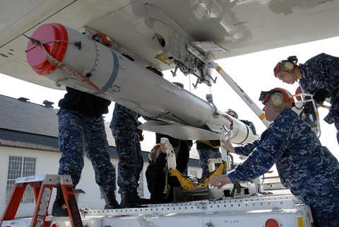 SLAM ER being loaded c US Navy