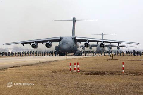 Paratroopers board a Y-20