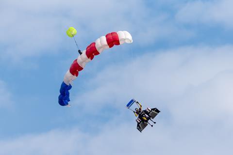 Watch Two Men in Jetpacks Fly Alongside a Jumbo Jet Over Dubai