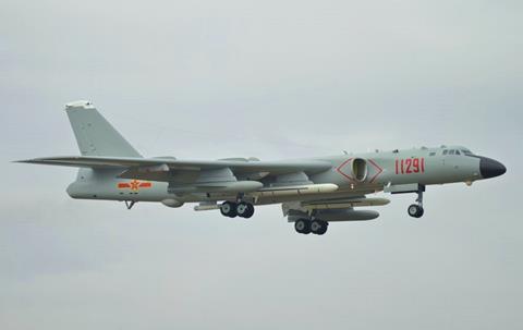 A Xian H-6K bomber landing at Zhuhai Jinwan airport ahead of Airshow China 2018 c WikiCommons