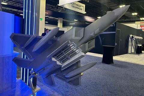 Low-observable external fuel tanks for F-22 model at AFA Warfare Symposium