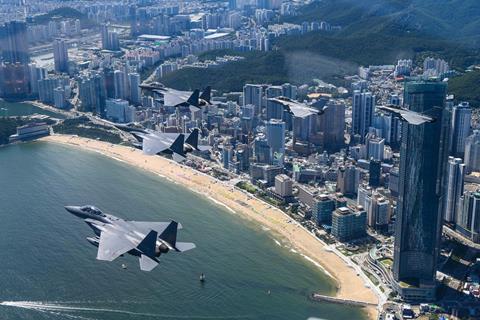 F-15Ks fly over Busan with Rafales